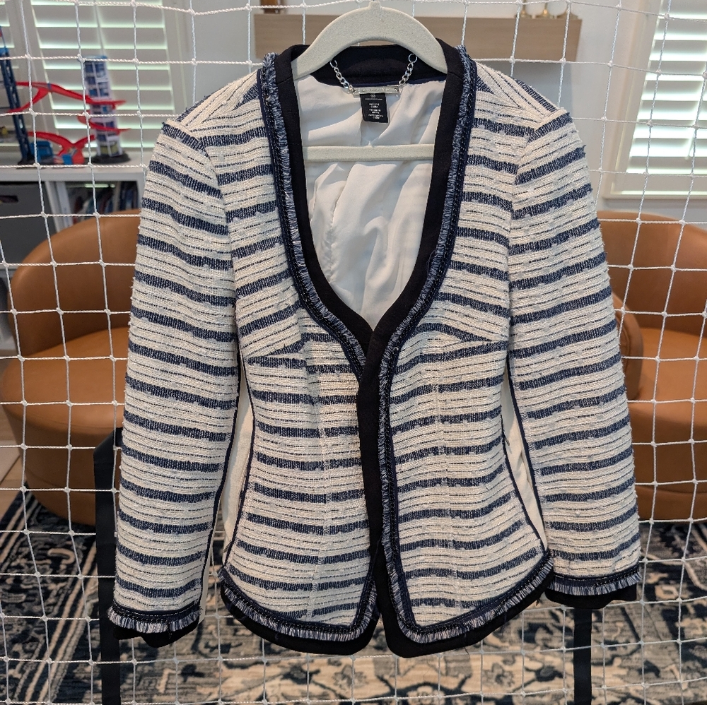 Blue and white jacket, slight sparkle.